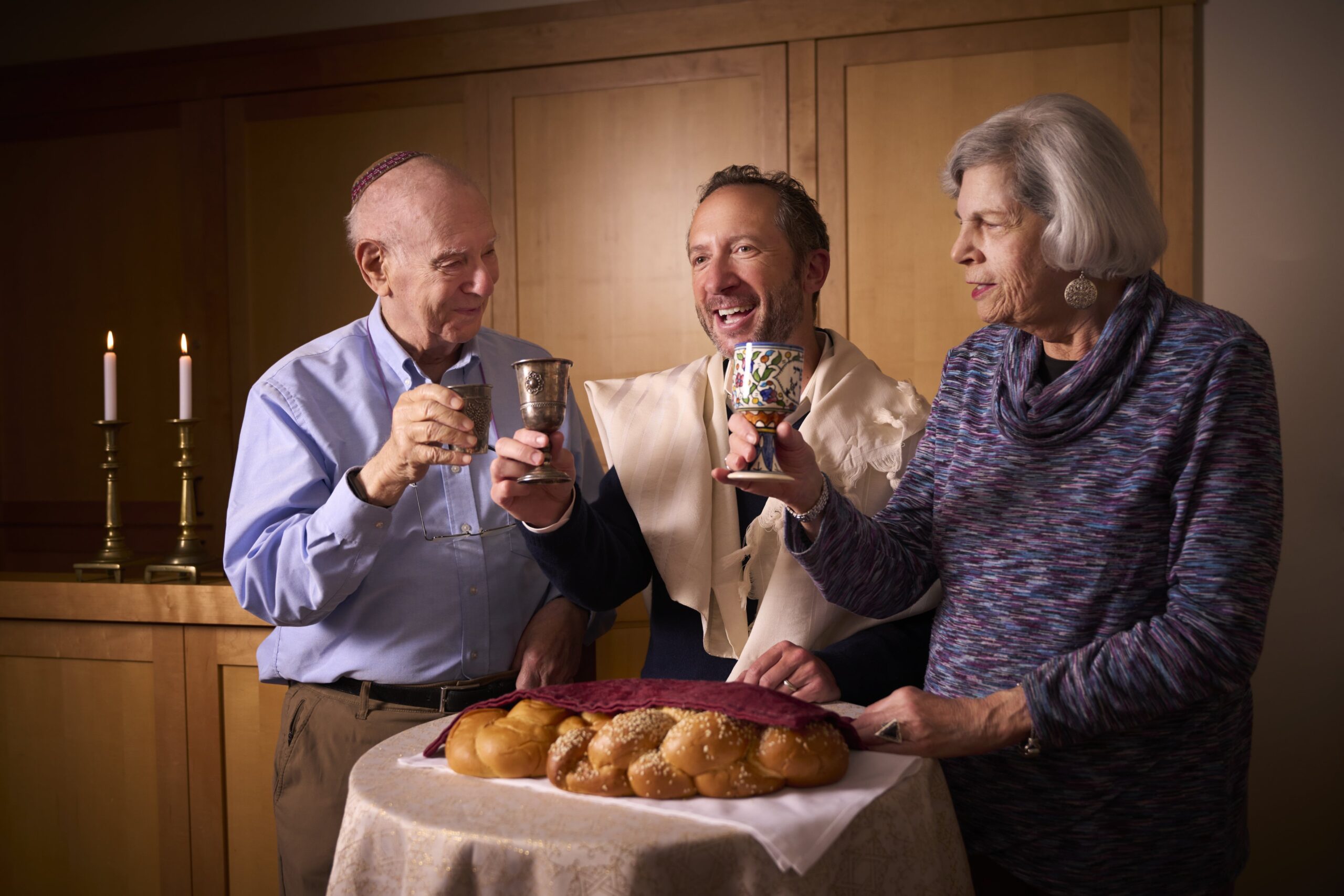 Rabbi holding up a cup